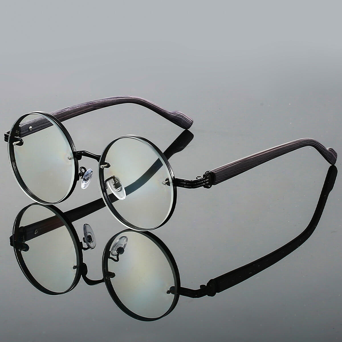 Unisex Retro Round Sunglasses with Tinted Lenses and Textured Temples